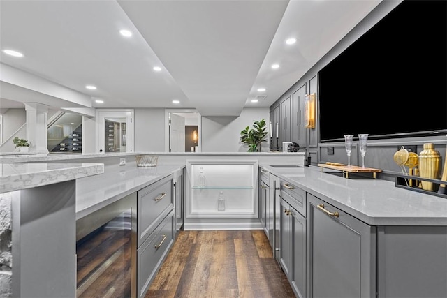 152 Devonwood Dr, Upper St Clair, PA 15241 - kitchen with gray cabinetry, beverage cooler, dark wood-type flooring, recessed lighting, and a sink