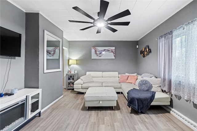 545 Ohio Ave, Midland Boro, PA 15059 - living room with a baseboard heating unit, ornamental molding, wood finished floors, ceiling fan, and baseboards