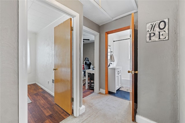 545 Ohio Ave, Midland Boro, PA 15059 - corridor featuring wood finished floors, baseboards, and a sink