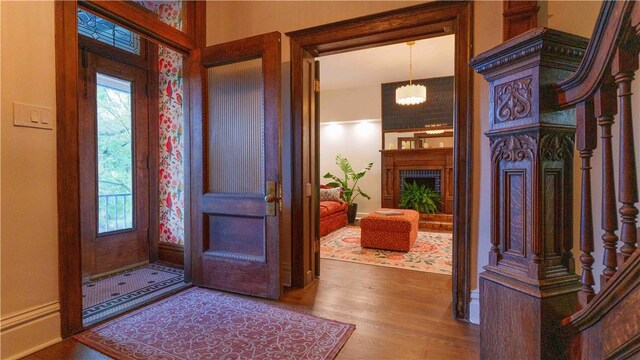 715 Chislett, East Liberty, PA 15206 - entrance foyer featuring wood finished floors, baseboards, and a chandelier