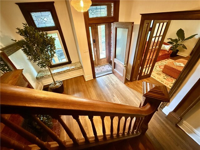 715 Chislett, East Liberty, PA 15206 - entryway with wood finished floors, plenty of natural light, baseboards, and stairway