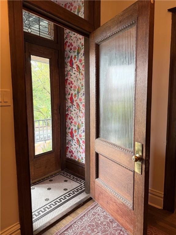 715 Chislett, East Liberty, PA 15206 - doorway featuring baseboards and wood finished floors