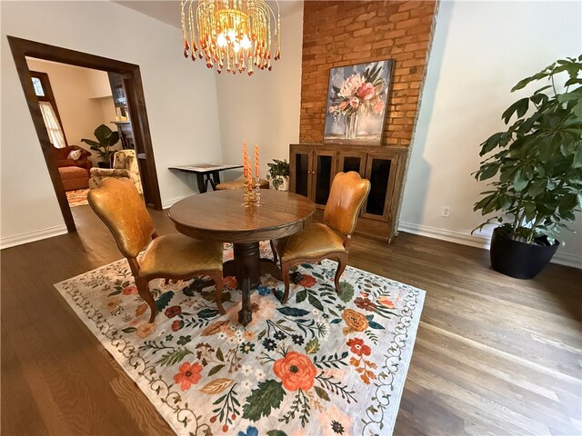 715 Chislett, East Liberty, PA 15206 - dining area featuring baseboards, wood finished floors, and a chandelier