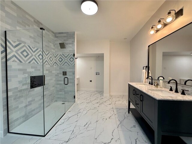 715 Chislett, East Liberty, PA 15206 - bathroom with marble finish floors, double vanity, a shower stall, and baseboards