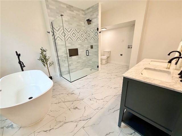 715 Chislett, East Liberty, PA 15206 - bathroom featuring marble look tiles, a freestanding bath, a stall shower, double vanity, and baseboards