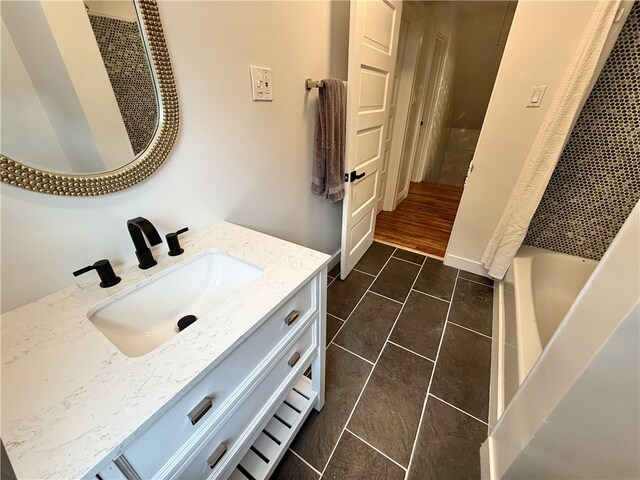 715 Chislett, East Liberty, PA 15206 - bathroom featuring vanity, tile patterned flooring, and shower / tub combo with curtain