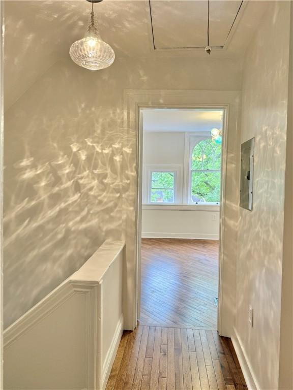 715 Chislett, East Liberty, PA 15206 - corridor with attic access, wood-type flooring, and electric panel