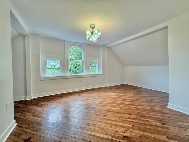 715 Chislett, East Liberty, PA 15206 - bonus room featuring dark wood-style flooring, vaulted ceiling, and baseboards