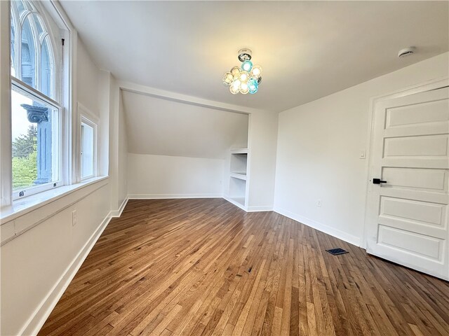 715 Chislett, East Liberty, PA 15206 - bonus room with hardwood / wood-style flooring, baseboards, and vaulted ceiling