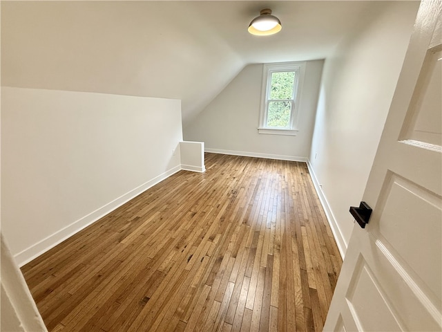 715 Chislett, East Liberty, PA 15206 - additional living space with hardwood / wood-style floors, vaulted ceiling, and baseboards