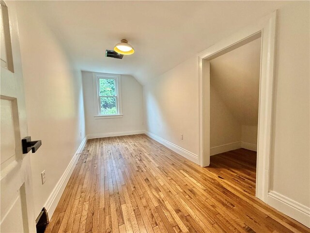 715 Chislett, East Liberty, PA 15206 - bonus room with light wood finished floors, lofted ceiling, and baseboards