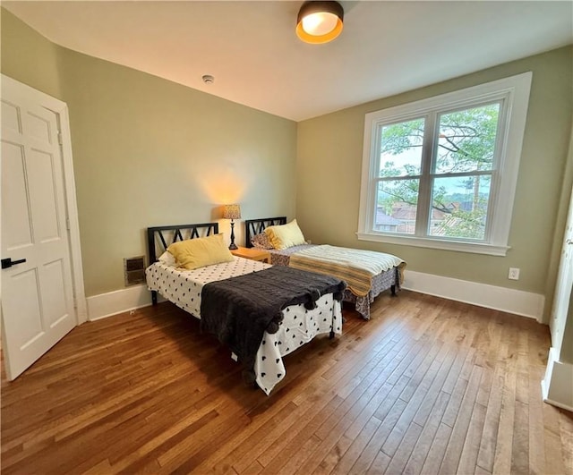 715 Chislett, East Liberty, PA 15206 - bedroom with wood-type flooring and baseboards