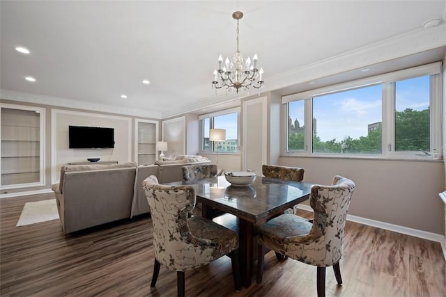 128 N Craig St Unit 415, Oakland, PA 15213 - dining room with ornamental molding, a chandelier, dark wood-style floors, baseboards, and built in features