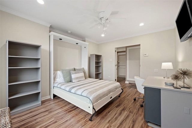128 N Craig St Unit 415, Oakland, PA 15213 - bedroom with ornamental molding, wood finished floors, baseboards, recessed lighting, and an office area