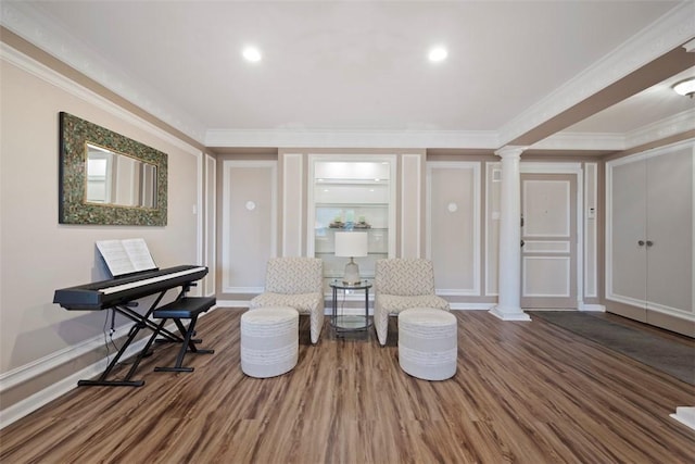 128 N Craig St Unit 415, Oakland, PA 15213 - sitting room featuring ornate columns, crown molding, wood finished floors, a decorative wall, and recessed lighting