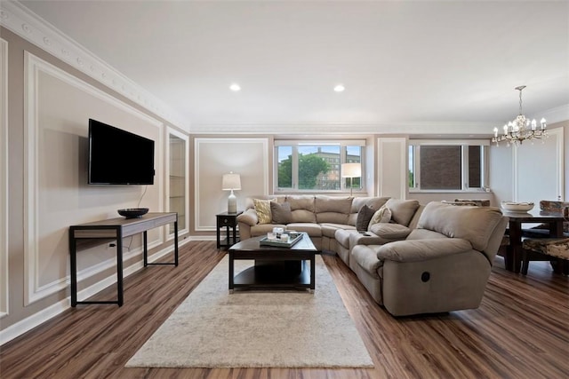 128 N Craig St Unit 415, Oakland, PA 15213 - living room with crown molding, a chandelier, dark wood finished floors, baseboards, and recessed lighting