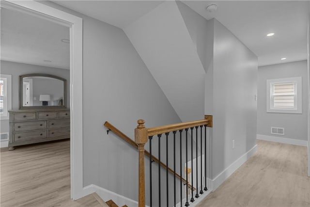 421 W College St, Canonsburg, PA 15317 - hallway featuring an upstairs landing, wood finished floors, healthy amount of natural light, baseboards, and recessed lighting