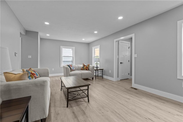 421 W College St, Canonsburg, PA 15317 - living area featuring light wood-style flooring, baseboards, and recessed lighting