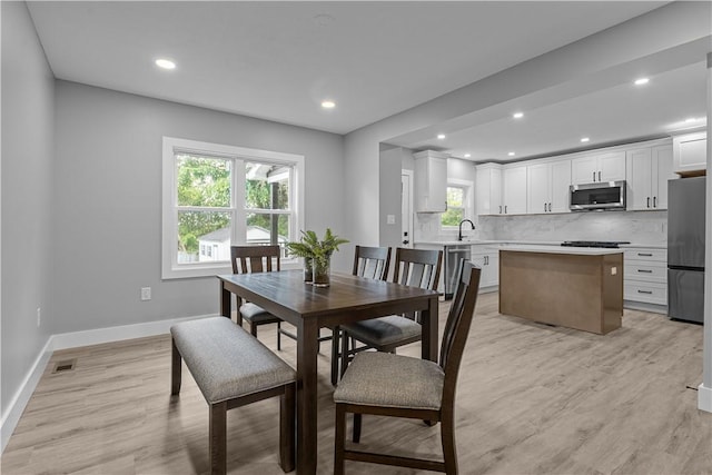 421 W College St, Canonsburg, PA 15317 - dining area featuring light wood-type flooring, baseboards, and recessed lighting