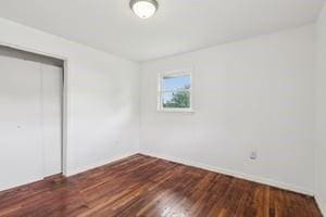 200 Edgewood Dr, Hopewell Twp Bea, PA 15001 - unfurnished bedroom with wood finished floors, a closet, and baseboards