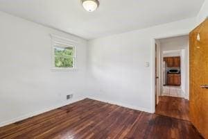 200 Edgewood Dr, Hopewell Twp Bea, PA 15001 - spare room with wood finished floors and baseboards