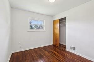 200 Edgewood Dr, Hopewell Twp Bea, PA 15001 - unfurnished bedroom featuring wood finished floors, baseboards, and a closet