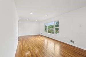 200 Edgewood Dr, Hopewell Twp Bea, PA 15001 - spare room featuring wood finished floors, baseboards, and recessed lighting