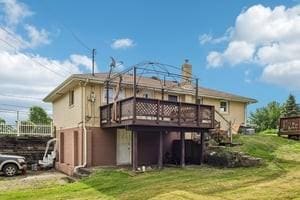 200 Edgewood Dr, Hopewell Twp Bea, PA 15001 - back of property with a wooden deck and a yard