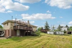 200 Edgewood Dr, Hopewell Twp Bea, PA 15001 - view of grassy yard featuring a deck