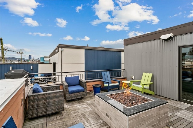 4707 Hatfield St, Lawrenceville, PA 15201 - wooden deck with a fire pit and grilling area