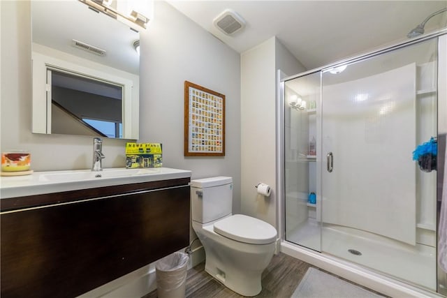 4707 Hatfield St, Lawrenceville, PA 15201 - full bathroom featuring wood finished floors, vanity, and a stall shower