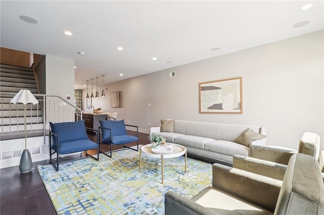 4707 Hatfield St, Lawrenceville, PA 15201 - living area featuring wood finished floors, stairs, and recessed lighting
