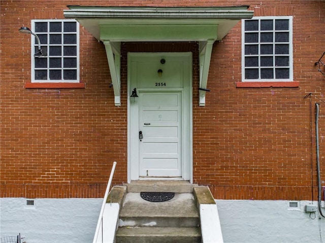 2554 Rte 259, Fairfield Twp, PA 15923 - view of exterior entry with crawl space and brick siding