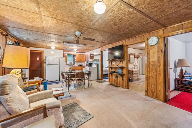 2554 Rte 259, Fairfield Twp, PA 15923 - living area with light colored carpet and wood walls