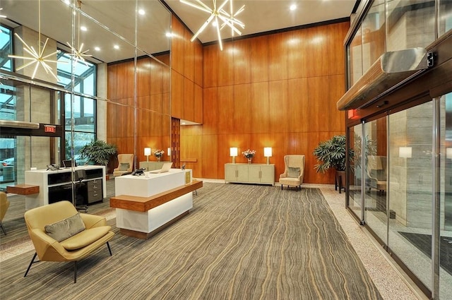 320 Fort Duquesne Blvd Unit 18F, Downtown Pgh, PA 15222 - lobby with a high ceiling and wood walls