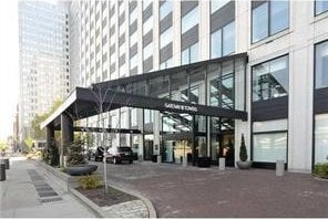 320 Fort Duquesne Blvd Unit 18F, Downtown Pgh, PA 15222 - common area with a high ceiling