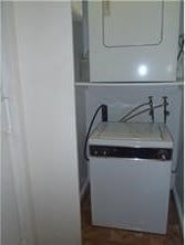 320 Fort Duquesne Blvd Unit 18F, Downtown Pgh, PA 15222 - laundry area featuring estacked washer and dryer