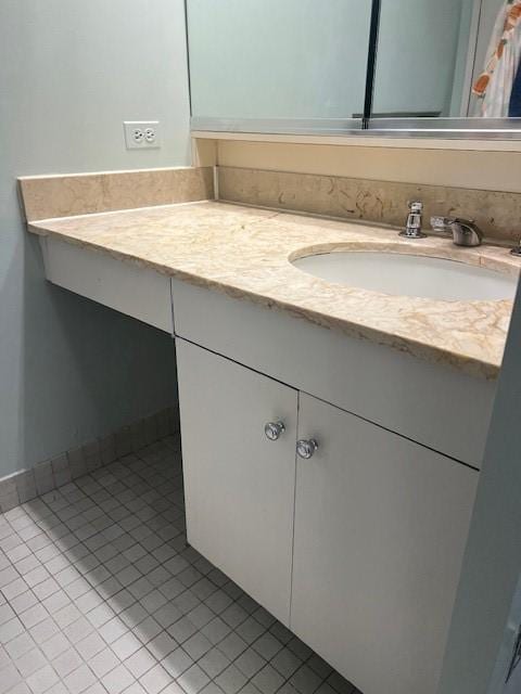 320 Fort Duquesne Blvd Unit 18F, Downtown Pgh, PA 15222 - bathroom with vanity and tile patterned flooring