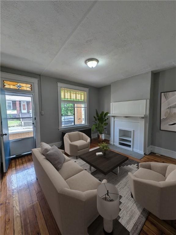 2759 Glen Mawr St, Sheraden, PA 15204 - living area with a textured ceiling and hardwood / wood-style floors