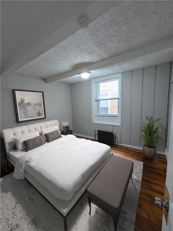 2759 Glen Mawr St, Sheraden, PA 15204 - bedroom with radiator, wood finished floors, and a textured ceiling