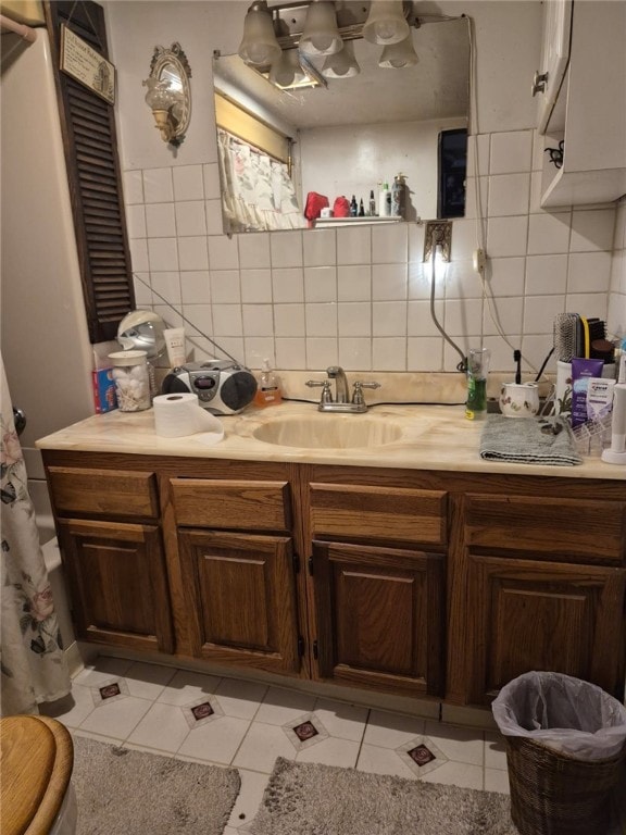 29564 Lake Creek Rd, Pa, PA 16314 - full bathroom featuring decorative backsplash, vanity, and tile patterned flooring