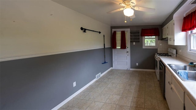 1153 Yanks Ln, South Park, PA 15236 - kitchen with a sink, white cabinets, ceiling fan, light countertops, and dishwasher