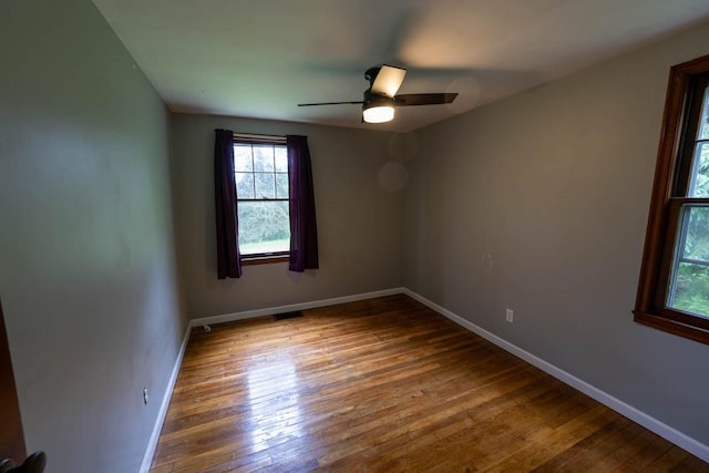 1153 Yanks Ln, South Park, PA 15236 - unfurnished room with healthy amount of natural light, hardwood / wood-style flooring, and baseboards