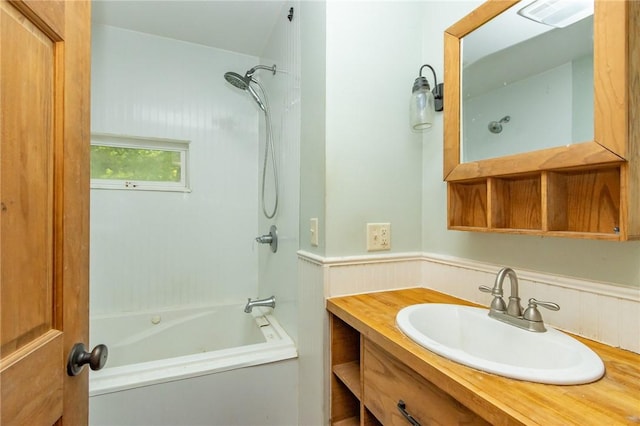 1017 Olive Ave, Natrona Hts/Harrison Twp, PA 15065 - bathroom featuring vanity, tub / shower combination, and wainscoting