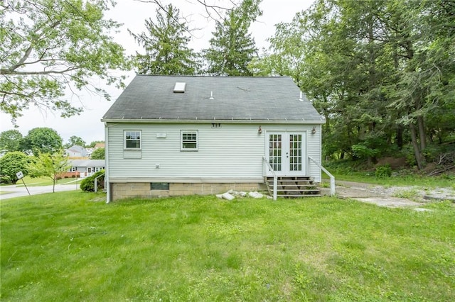 1017 Olive Ave, Natrona Hts/Harrison Twp, PA 15065 - back of property featuring french doors and a lawn