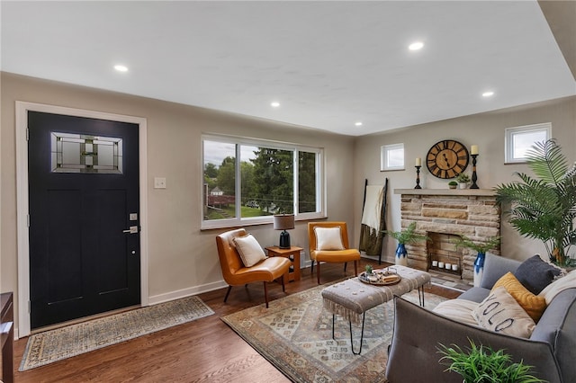 3815 Foster Rd N, Versailles, PA 15137 - living area featuring baseboards, wood finished floors, recessed lighting, and a fireplace