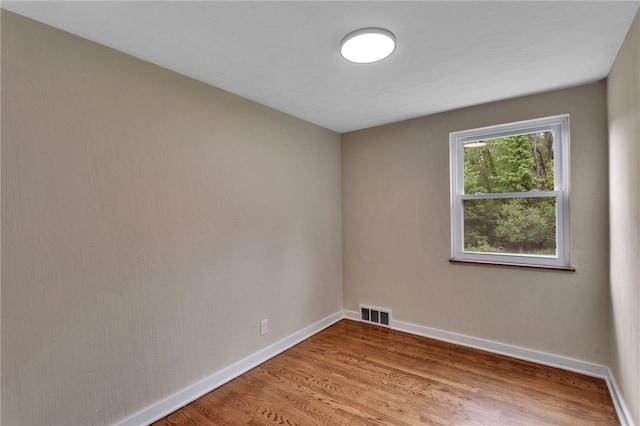 3815 Foster Rd N, Versailles, PA 15137 - empty room featuring baseboards and wood finished floors