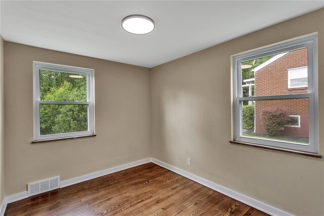 3815 Foster Rd N, Versailles, PA 15137 - unfurnished room with baseboards and wood finished floors