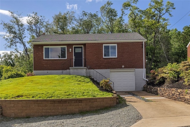 3815 Foster Rd N, Versailles, PA 15137 - ranch-style home with driveway, brick siding, a front lawn, and an attached garage