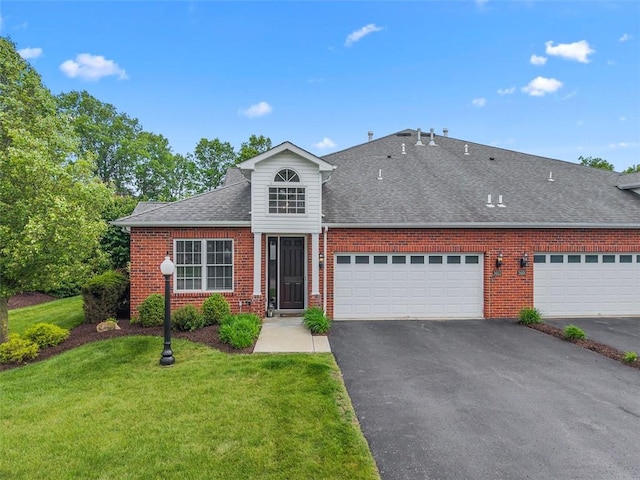 3602 Senate Ct, Adams Twp, PA 16059 - traditional home with brick siding, asphalt driveway, a front lawn, a shingled roof, and a garage